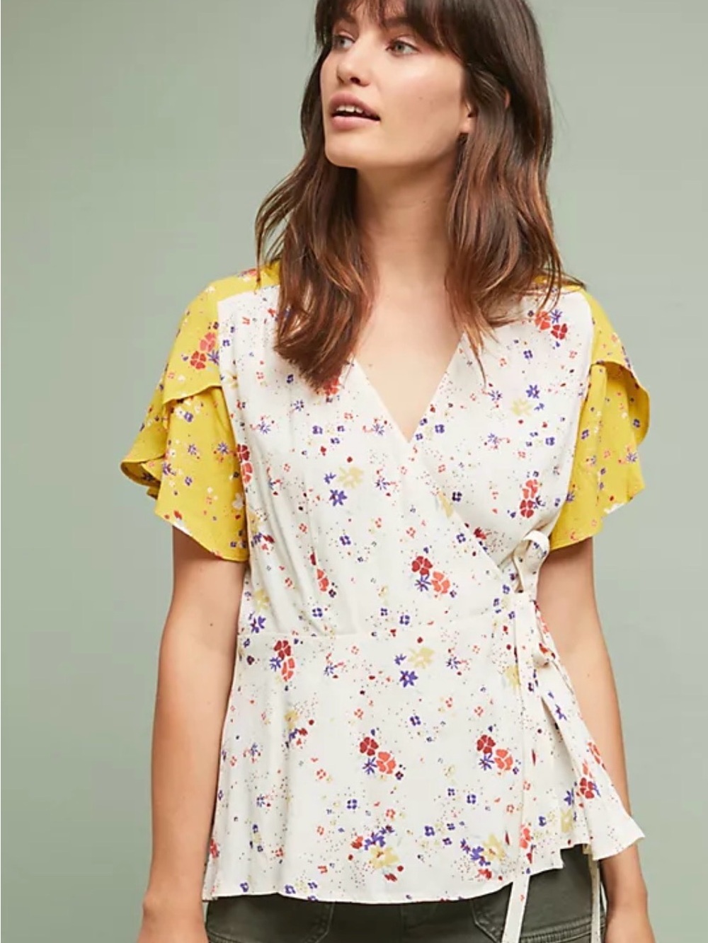 Anthropologie White Floral Wrap Top with Yellow Flutter Sleeves